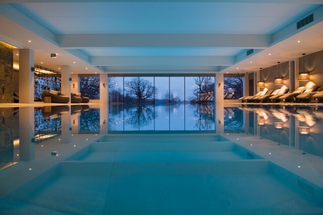 South Lodge view of the indoor pool at nightime