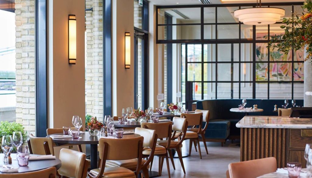 Sams Riverside-wide interior view of dining room next to window